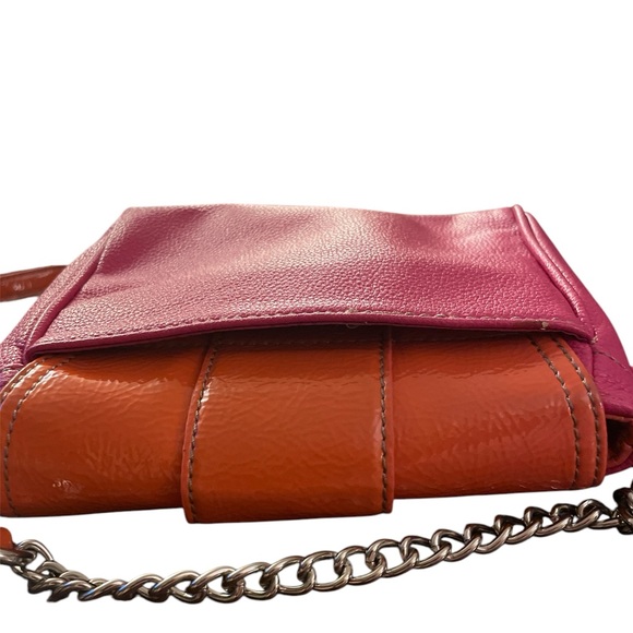 Nine West Coral
Pebbled Leather ILike
Handbag Swing Pack
Adjustable Strap - Picture 4 of 14